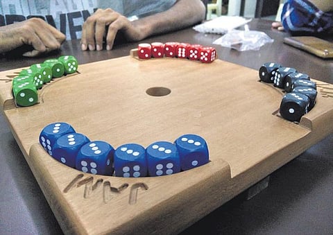 Carrom with a dice
