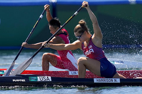 Nevin Harrison of the United States, right, and Lin Wenjun of China compete in the women's canoe single 200m semifinal at the 2020 Summer Olympics. (Photo | AP)