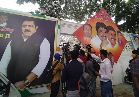 Media persons gathered at MLA Zameer Ahmed Khan's house during ED raids at Shivaji Nagar in Bengaluru on Thursday. (Photo | EPS/Shriram BN)