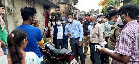 Officials encouraging residents in Bankatwa to come forward and get vaccinated. (Photo | Express)