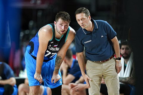 Slovenia's Luka Doncic (77) talks with head coach Sekulic Aleksander during a men's basketball semifinal round game against France. (Photo | AP)
