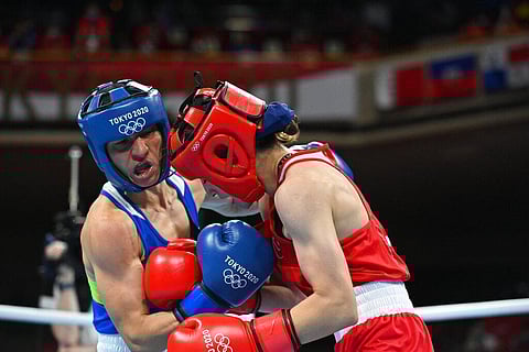 Turkey's Buse Naz Cakiroglu, in red, exchanges punches with Bulgaria's Stoyka Zhelyazkova Krasteva during their women's flyweight 51-kg boxing gold medal match. (Photo | AP)