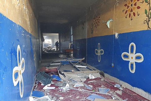 A damaged school is seen after airstrikes in Lashkar Gah city of Helmand province, southern Kabul, Afghanistan, Sunday, Aug. 8, 2021.(Photo | AP)