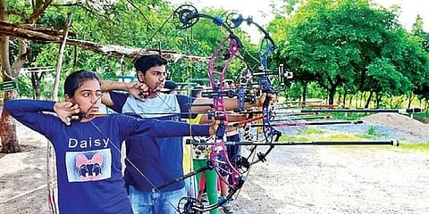 Teen archers plying their trade at the Karimnagar Archery Academy in the premises of City Police Training Centre. (Photo | Express)