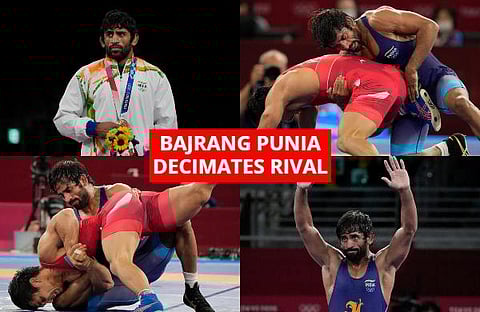 Indian wrestler Bajrang Punia won a bronze medal in the men's freestyle 65kg category in the ongoing Tokyo Olympics after defeating Kazakhstan's Daulet Niyazbekov. (Photo | AP)