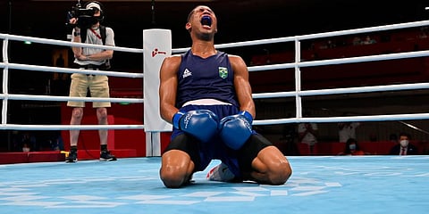 Brazil's Hebert Sousa celebrates after his men's middleweight 75-kg boxing gold medal match against Ukraine's Oleksandr Khyzhniak at the 2020 Summer Olympics in Tokyo, Japan. (Photo | AP)
