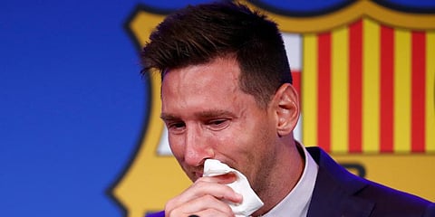 Lionel Messi cries at the start of a press conference at the Camp Nou stadium in Barcelona, Spain. (Photo | AP)