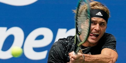 Alexander Zverev returns a shot to Sam Querrey during the first round of the US Open tennis championships in New York. (Photo | AP)