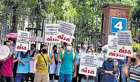 AISA members protest outside DU campus on Tuesday demanding reopening of campus of the university. (Photo | EPS)