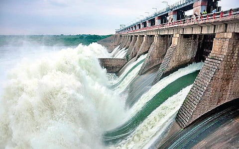 Floodwater gushes out of the crest gates of the Musi project in Nalgonda district on Tuesday. (Photo | Express)