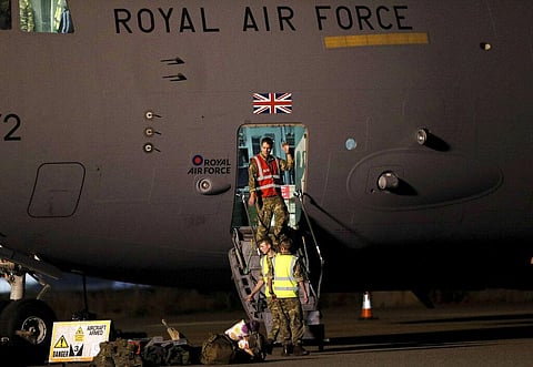 British military personnel depart a C-17 aircraft at RAF Brize Norton, Oxfordshire, late Sunday, Aug. 29, 2021. (Photo | AP)