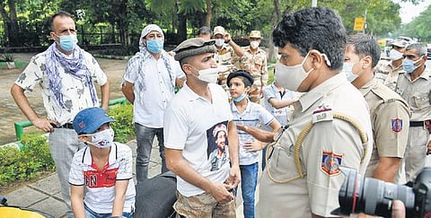 A group of Afghan refugees who came to protest outside the Pakistan  High Commission being stopped by Delhi Police on Thursday | Shekhar yadav