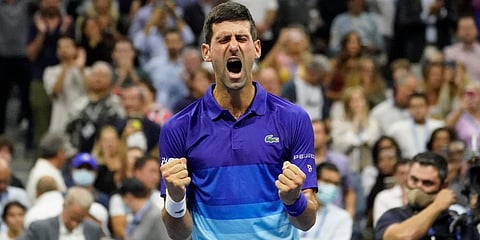 Novak Djokovic, of Serbia, reacts after defeating Alexander Zverev, of Germany, during the semifinals of the US Open tennis championships, Friday, Sept. 10, 2021, in New York. (Photo | AP)