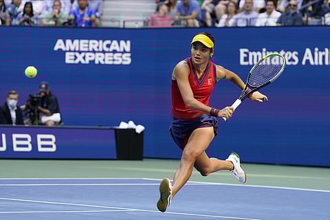Emma Raducanu, of Britain, chases down a shot from Leylah Fernandez, of Canada, during the women's singles final of the US Open tennis championships, Saturday, Sept. 11, 2021, in New York. (AP Photo)