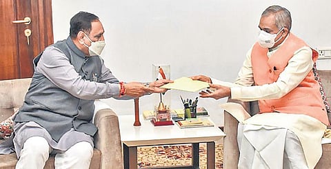 Vijay Rupani submits his resignation to governor Acharya Devvrat. (Photo | PTI)