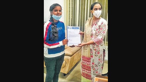 Jayalakshmi with  WDCW Special Secretary Divya Devarajan; 