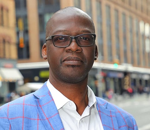 This photo provided by Restaurant Opportunities Centers shows Sekou Siby, president of Restaurant Opportunities Center United. (Photo | AP)
