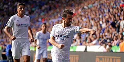 Manchester City's Bernardo Silva celebrates scoring their side's first goal of the game during their English Premier League soccer match at The King Power Stadium, Leicester. (Photo | AP)