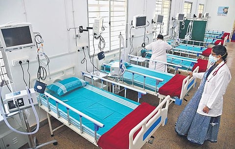 Beds kept ready at the KSRTC Hospital, which has been converted into a Covid treatment facility for children, in Bengaluru on Sunday | Express