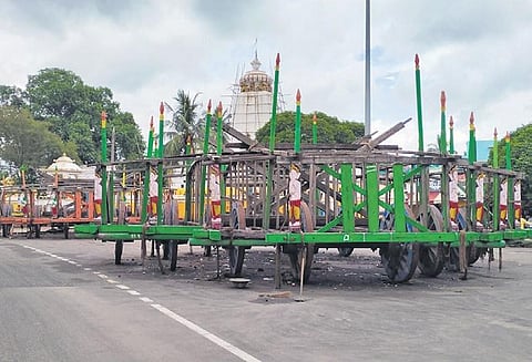 Partially constructed chariots of the Trinity stationed in Baripada | Express