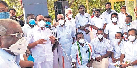 Opposition leader V D Satheesan inaugurating the 30th day of protest by the Congress at Thiruvallam toll plaza on Tuesday. Kovalam MLA M Vincent is also seen