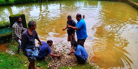 Divers trying to find the idol in Gonarahalli in Kumta taluk of Uttara Kannada district.