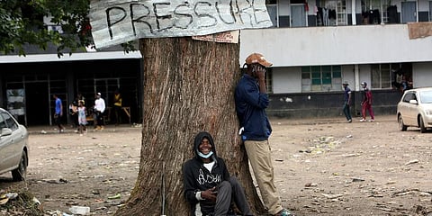 A man sits under a tree in Zimbabwe's capital Harare. (Representational Image | AP)