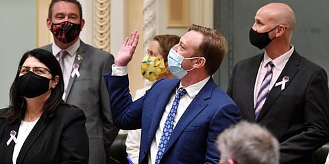 Queensland state Deputy Premier Steven Miles, center, waves to the public gallery after the vote for the Voluntary Assisted Dying bill at Queensland Parliament in Brisbane, Sept 16, 2021. (Photo | AP)