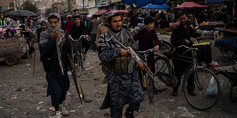 Taliban fighters patrol a market in Kabul's Old City, Afghanistan, Tuesday, Sept. 14, 2021. (Photo | AP)