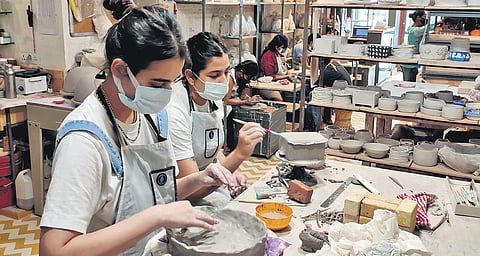 Participants at a workshop by The Clay Company.
