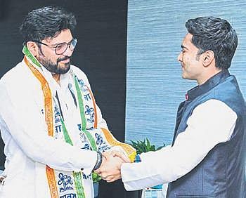 MP Babul Supriyo is welcomed by TMC’s Abhishek Banerjee to the party | Pti