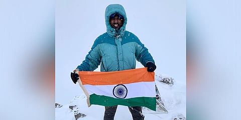 Naveen Mallesh holds the Tricolour after his summit of Mt Elbrus | Express