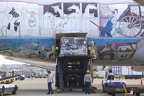 Taiwan Centers for Disease Control, workers unload a shipment of Pfizer-BioNTech vaccines from an aircraft at the Taoyuan International Airport (Photo | AP)