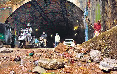 Boulders block the road at Chittinagar tunnel on Wednesday. (Photo | Prasant Madugula, EPS)