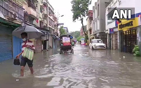The Met department has forecast more heavy rain or thunderstorms till Tuesday morning in most districts of south Bengal, including in Kolkata. (Photo | ANI Twitter)
