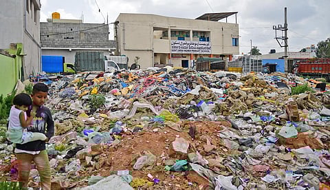 The playground for kids studying at Govt. Urdu Higher Primary school, Devasandra, has turned into a dumping yard. (Photo | Shriram BN, EPS)