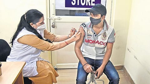 A beneficiary gets Covid vaccine at a centre in New Delhi  | Parveen negi
