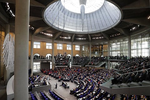 German lawmakers attend the first meeting of the German parliament after the election at the plenary hall inside the Reichstag building in Berlin. (File photo | AP)