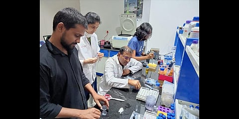 Dr Anil K Suresh, Associate Professor, Department of Biological Sciences, and his team at work.