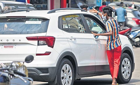 Mediators stop cars in the middle of the road to persuade them to buy car accessories at General Patters Road in Chennai. (Photo | R Satish Babu, EPS)