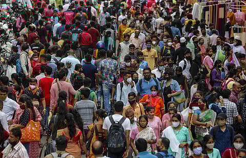 People crowd a market ahead of the Ganesh Chaturti festival in Mumbai on September 5 (Photo | AP)