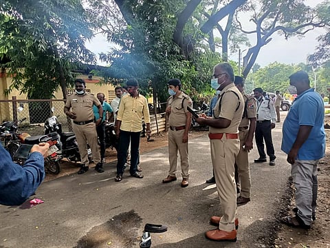 Police officers at the spot where the woman was stabbed to death (Photo | Special arrangement)
