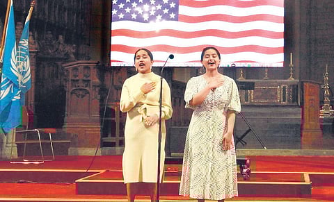 Teresa and Augnes recite the national anthems of countries at St John’s Cathedral in Brisbane | Express