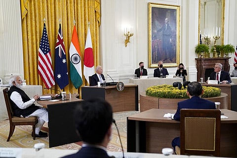 President Joe Biden listens during the Quad summit with Australian Prime Minister Scott Morrison, Indian Prime Minister Narendra Modi, and Japanese Prime Minister Yoshihide Suga (Photo | AP)