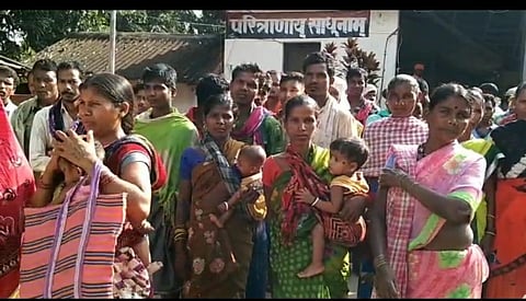 Tribal villagers at the police station to lodge complaints against the Maoists. (Photo | Special arrangement)
