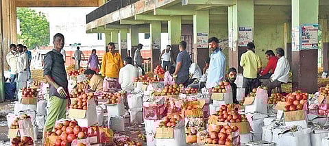 Market officials were busy announcing that it was the market’s last operational day at the present location in Kothapet on Saturday
