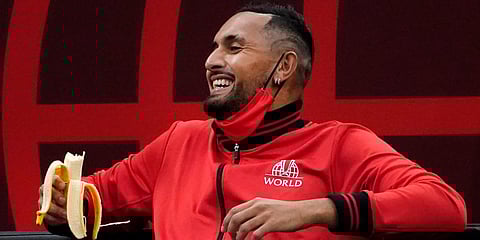 Nick Kyrgios laughs with teammates on the bench as they watch Team World's John Isner compete against Team Europe's Alexander Zverev during a Laver Cup match. (Photo| AP)
