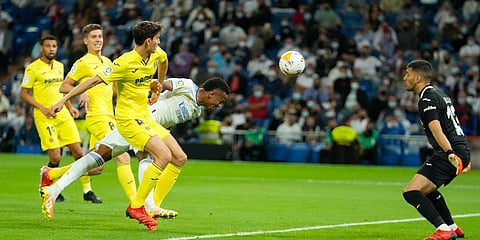 Real Madrid's Eder Militao puts his header wide of the goal during a La Liga match against Villarreal at the Bernabeu stadium in Madrid. (Photo| AP)