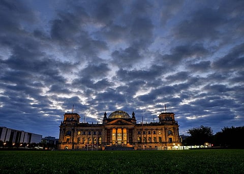 Clouds drift over the Reichstag building with the German parliament in Berlin, Germany. (Photo | AP)