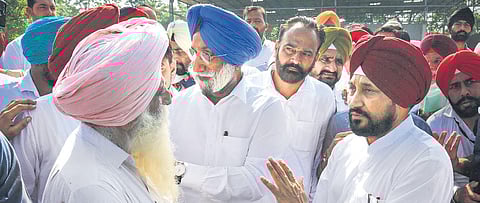 Channi (red turban) has said it was his priority to bring the culprits to book | Pti